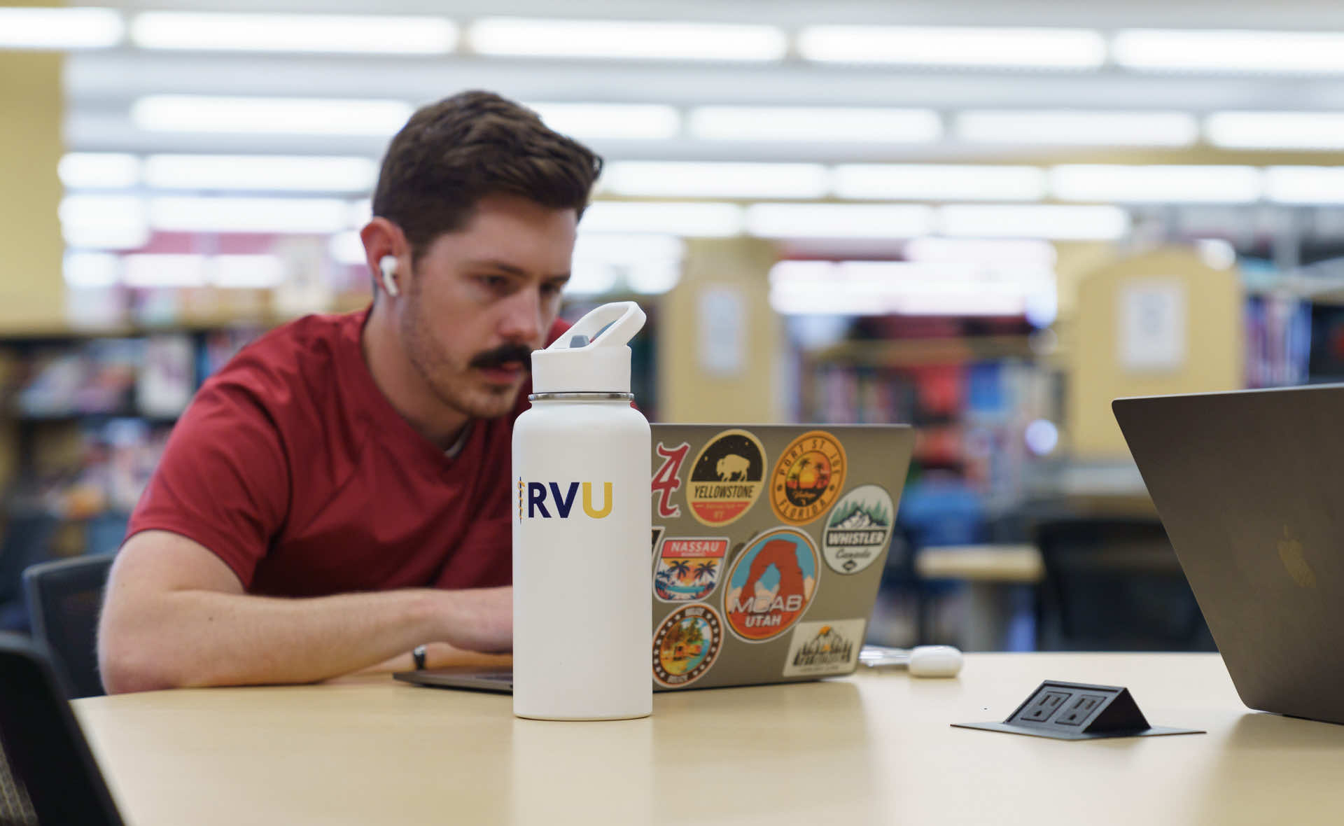 Student studying in library.