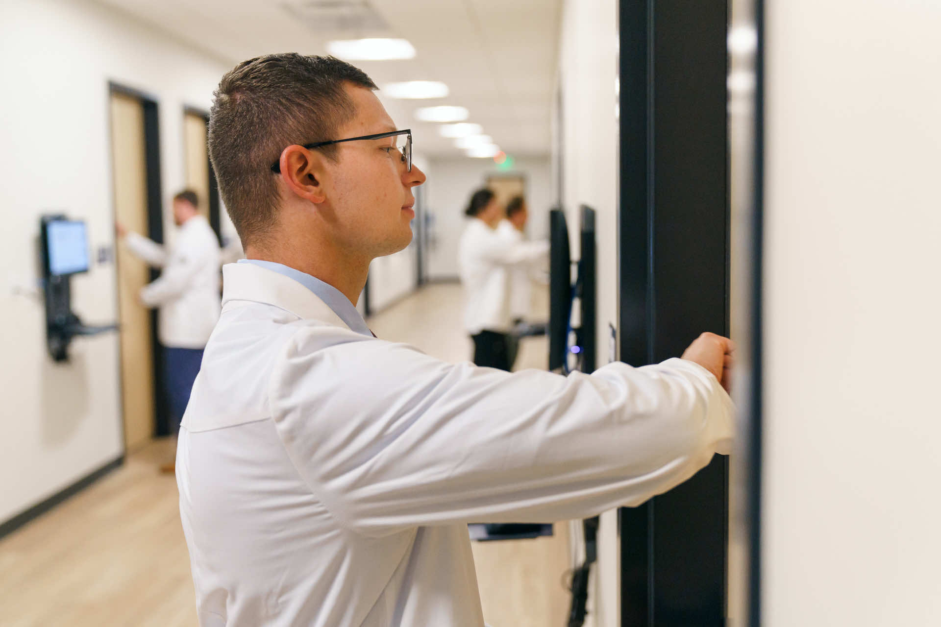 Man reaching into locker