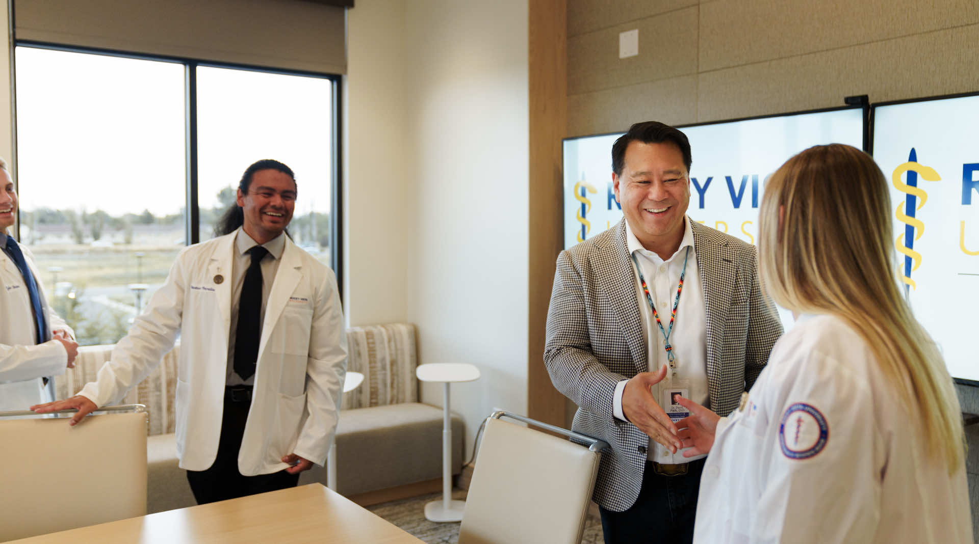 Man shaking hands in the conference room in Montana.