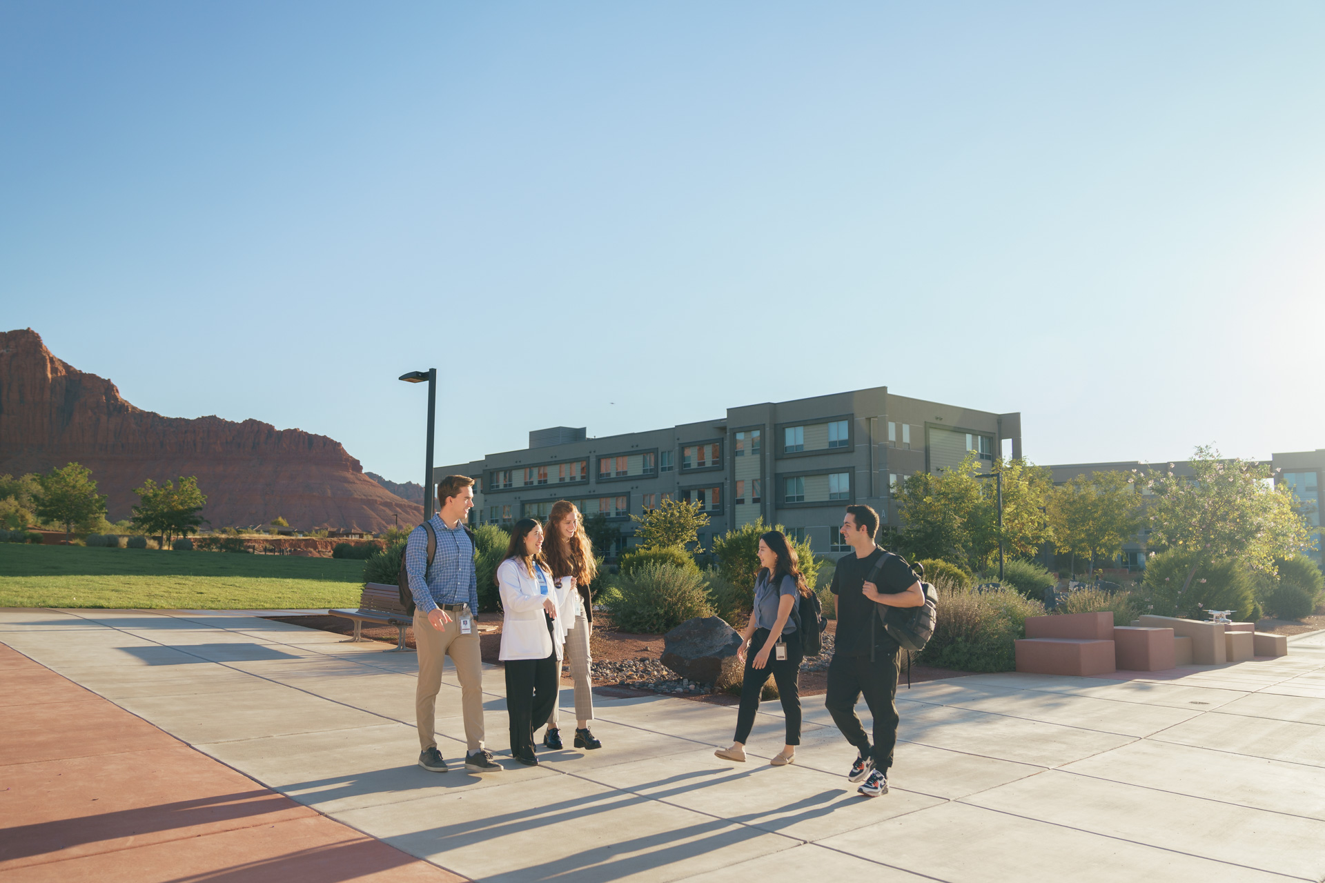 A group of students talking outside