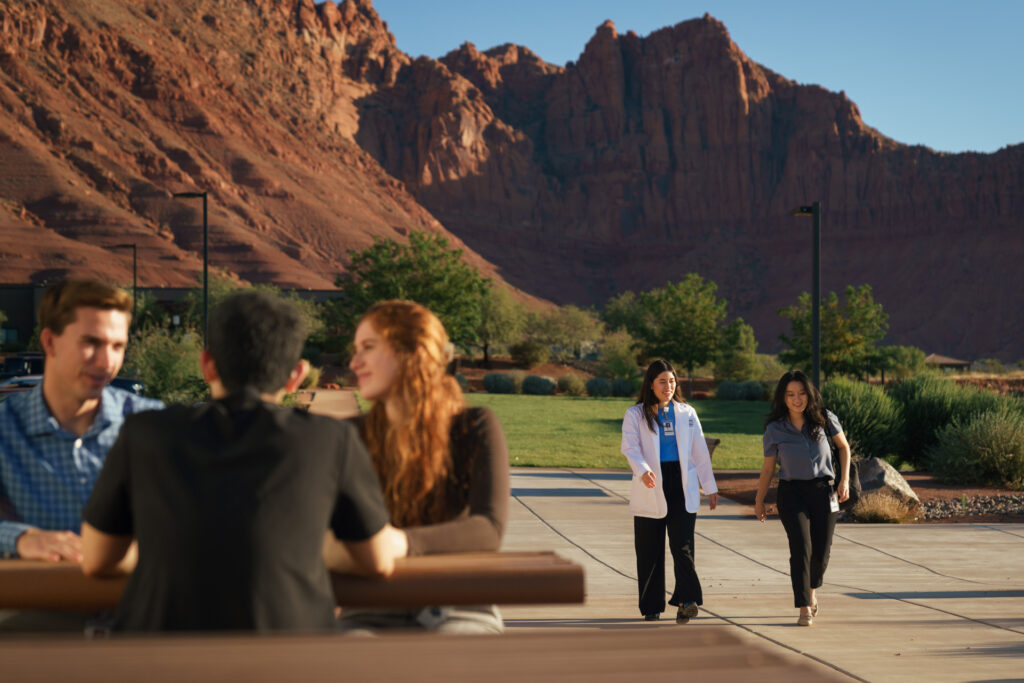 Students walking outside at Utah Campus. 